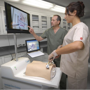 simulador para laparoscopia / de punción / para sutura / torso