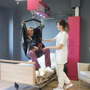 elevador de pacientes eléctrico / autoportante / mural / ajustable en altura