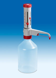 dispensador sobre frasco de laboratorio