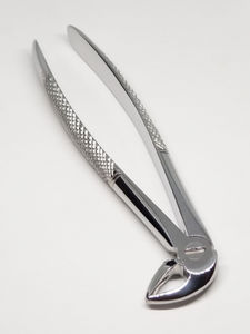 fórceps de extracción dental para premolares 1