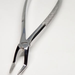 fórceps de extracción dental para raíz dental 1