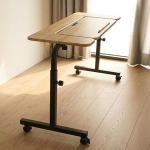 mesa de cama de altura regulable 1