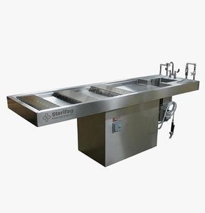 mesa de autopsia de medicina legal