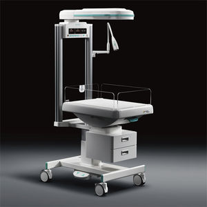 mesa de reanimación neonatal con lámpara de fototerapia