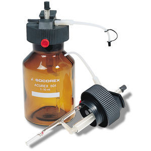 dispensador sobre frasco de laboratorio 1