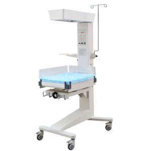 mesa de reanimación neonatal con lámpara de fototerapia