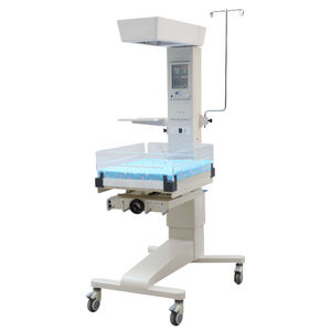 mesa de reanimación neonatal con lámpara de fototerapia