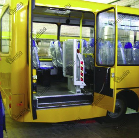 Plataforma elevadora para silla de ruedas - PPA-150 e - Ltd. Norma-Trade - montada en autobús