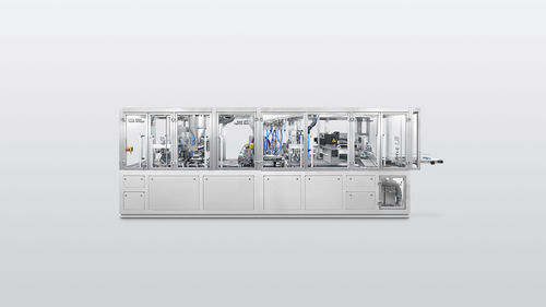 Sistema de embalaje semiautomático - PFM-T LS - Harro Hoefliger Verpackungsmaschinen - intermitente / formadora-llenadora-selladora / de vacío