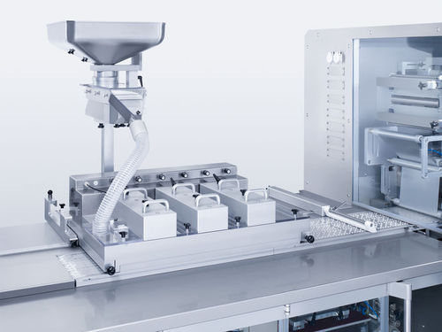 Alimentador dosificador vibratorio - Brush Box - Uhlmann - automático / para la industria farmacéutica / para comprimidos