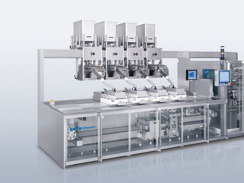 Alimentador dosificador vibratorio - Uhlmann - para comprimidos