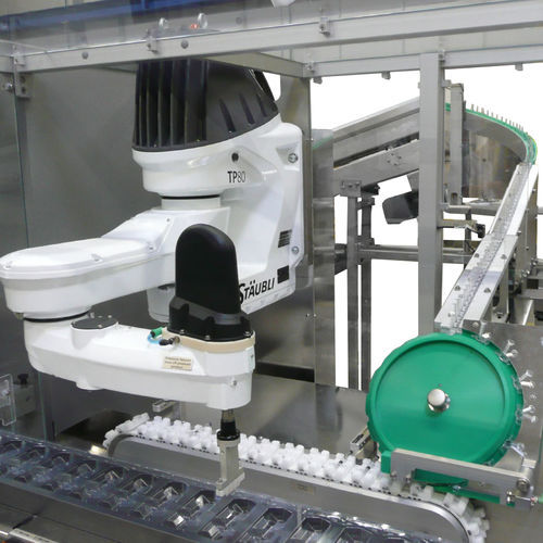 Alimentador de vacío - Heino Ilsemann GmbH - de banda / para máquina de embalaje / para jeringuilla