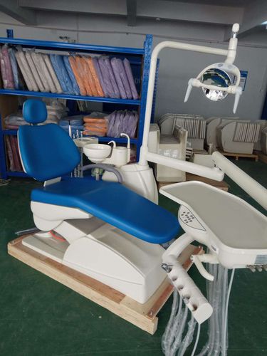 Unidad dental con sillón eléctrico - FD-180  - Hunan Fude Technology - con portainstrumentos / con luz LED