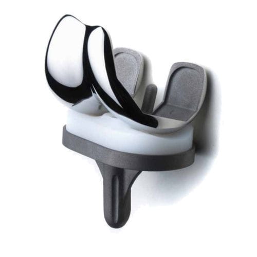 Prótesis de rodilla tricompartimental - Beznoska - de platillo fijo / cementada
