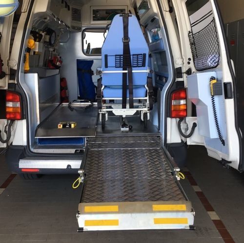 Plataforma elevadora para silla de ruedas - SCI series - Mariani Lift System - montada en vehículo