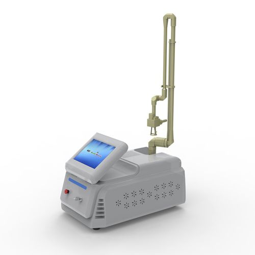 Láser para lesiones pigmentarias - Weifang KM Electronics - para el rejuvenecimiento de la piel / para la eliminación de tatuajes / para el tratamiento del acné