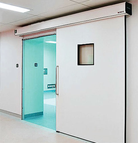 Puerta para centro sanitario - Woodmans Meditech - para aplicaciones farmacéuticas / corredera