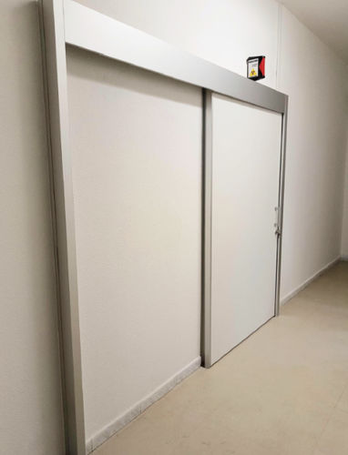 Puerta de protección radiológica - MeSpo - de hospital / corredera / de acero inoxidable