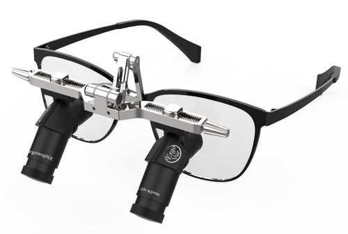 Lupa quirúrgica con montura de gafas - Ergo-Vue Flip - 3.0x - ErgonoptiX Alon Sabsay - con sistema abatible / con lámpara frontal