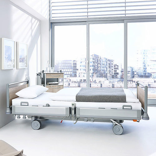 Cama de hospital - Puro - Stiegelmeyer GmbH & Co. KG - eléctrica / de altura regulable / muy baja