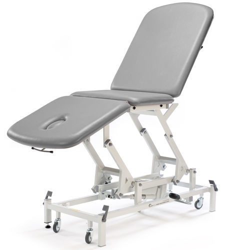 Mesa de reconocimiento de fisioterapia - ST3557 - SEERS Medical - hidráulica / de altura variable / con respaldo regulable