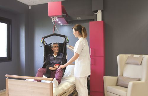 Elevador de pacientes eléctrico - INTEGRALIFT™ 230 - Integra International AS - de pared