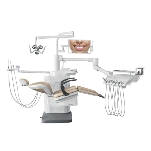 Unidad de tratamiento dental con sillón - Versa Clinic - DABI ATLANTE - con monitor / con portainstrumentos / con luz
