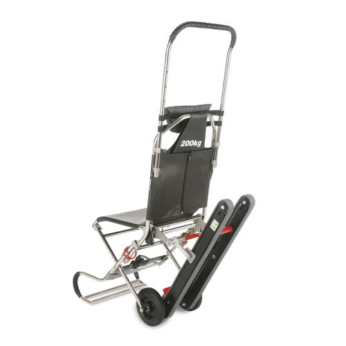 Silla de traslado de pacientes de interior - Compact 2 Track - Ferno (UK) Limited - de exterior / con ruedas / plegable