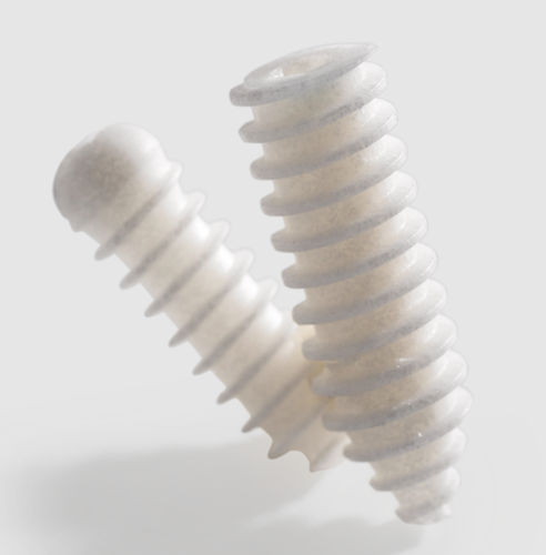 Tornillo interferencial ligamentos cruzados - ComposiTCP™ - Zimmer Biomet - reabsorbible