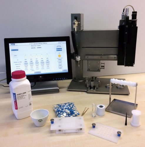 Máquina de llenado para cápsulas - Kapselabfüllung - Isotope Technologies Dresden 