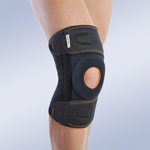 Órtesis de rodilla - 7119 - Orliman - con abertura en la rodilla / con almohadilla rotuliana / con refuerzo flexible