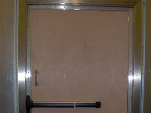 Puerta con blindaje RF - NELCO - de hospital / para resonancia magnética / abatible