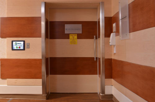 Puerta de protección radiológica - NELCO - para unidad de radiología / abatible