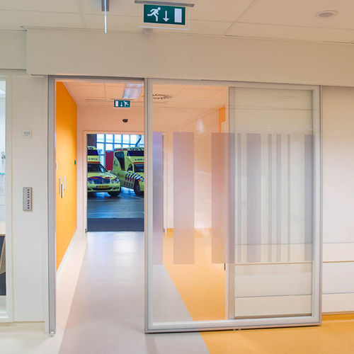 Puerta para centro sanitario - Medicare - Metaflex Doors Europe - para sala blanca / para aplicaciones farmacéuticas / corredera