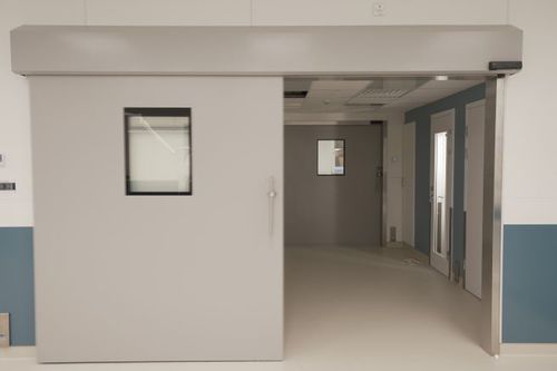 Puerta de protección radiológica -  Medinox - Metaflex Doors Europe - con blindaje / de hospital / para sala blanca