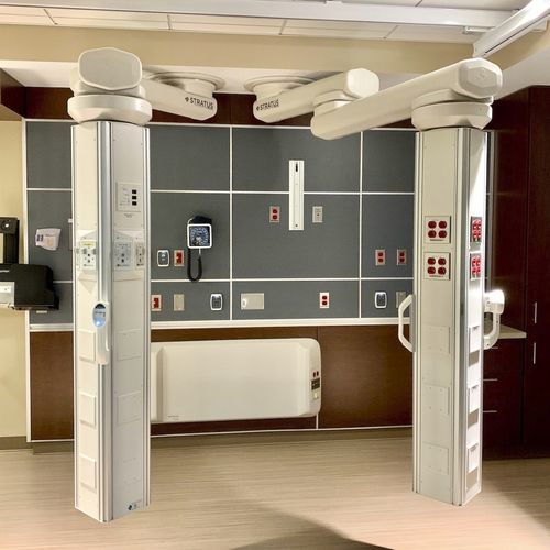 Brazo doble de distribución de techo - STRATUS® - Modular Services Company - para cuidados intensivos / articulado / con columna