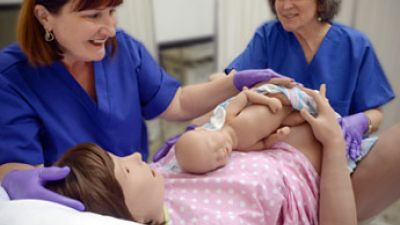 Simulador de paciente de parto - Lucina - Elevate Healthcare - para cuidados ginecológicos / femenino / fetal