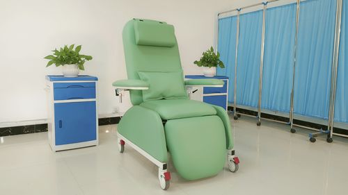 Sillón para extracción de sangre eléctrico - PY-YD-810 upgrade - Nanning Passion Medical Equipment - 3 secciones / con ruedas / Trendelenburg