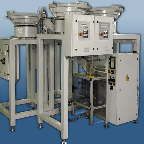 Alimentador para máquina de embalaje - Toss GmbH & Co. KG Verpackungssysteme