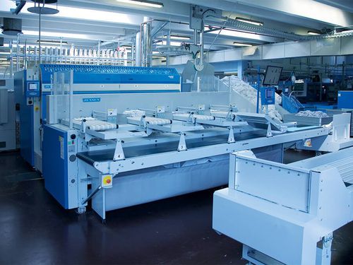 Dobladora de sábanas con sistema de apilamiento - MFS - Jensen-Group