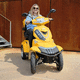 scooter para movilidad reducida eléctrico / con 4 ruedas / con baúl